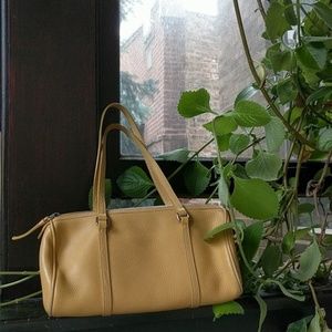 Dooney & Bourke yellow leather small barrel bag